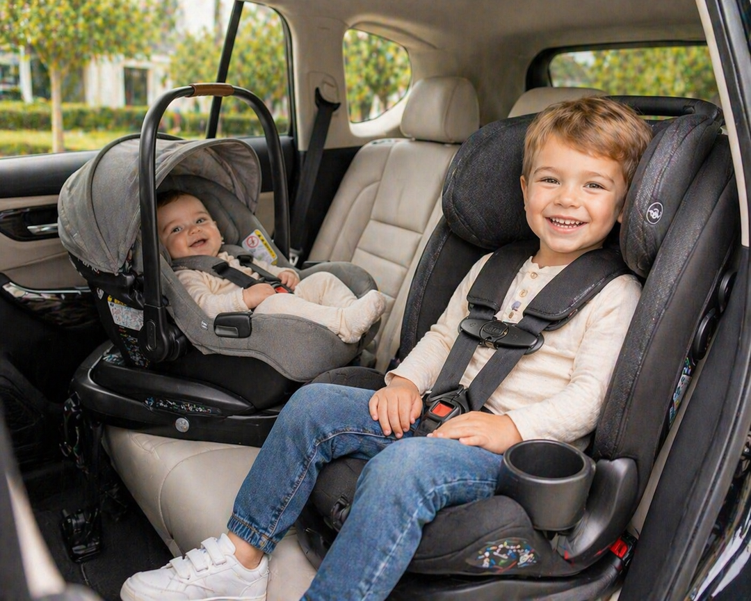 Car seats by age collection featuring a rear-facing infant carrier with a baby and a forward-facing toddler car seat inside a modern car interior