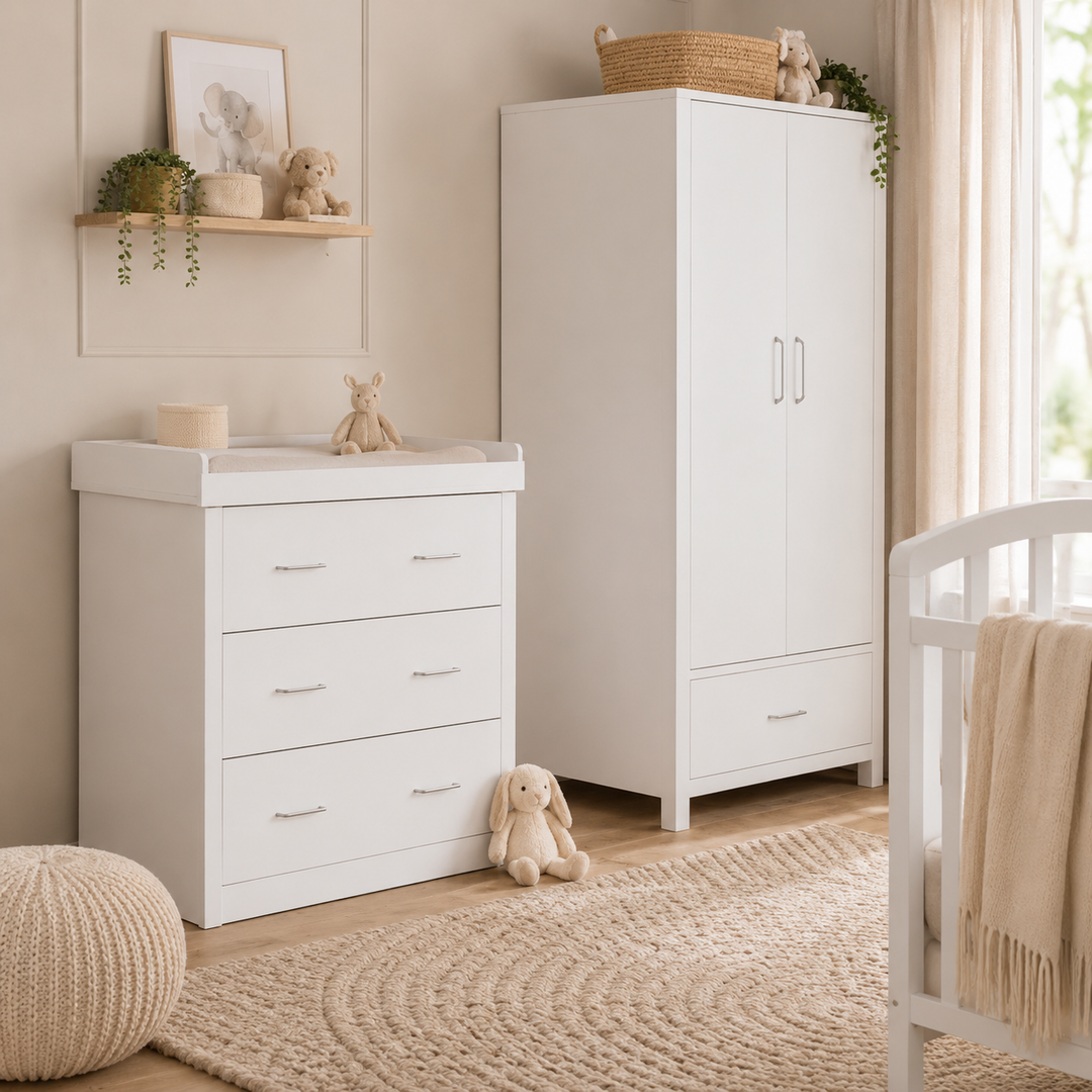 White nursery wardrobe and chest changer in a modern nursery