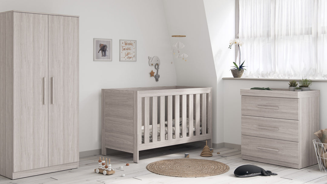 Little Acorns Amalfi nursery furniture collection including cot bed, wardrobe and chest changer in a modern nursery room