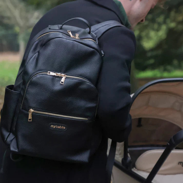 Baby accessories including changing bag, footmuff, and pushchair essentials designed for convenience and everyday parenting use