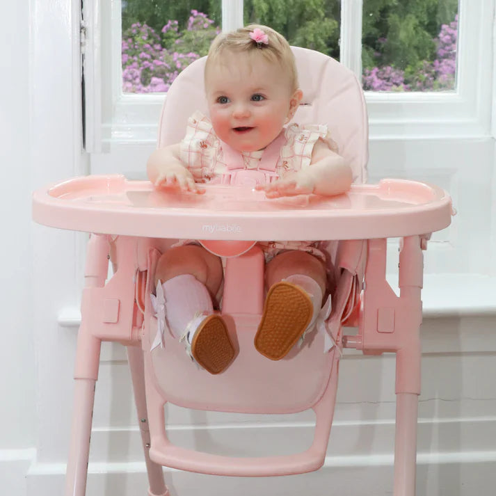 My Babiie highchair designed for baby feeding with adjustable seat, tray, and easy-clean materials for everyday use