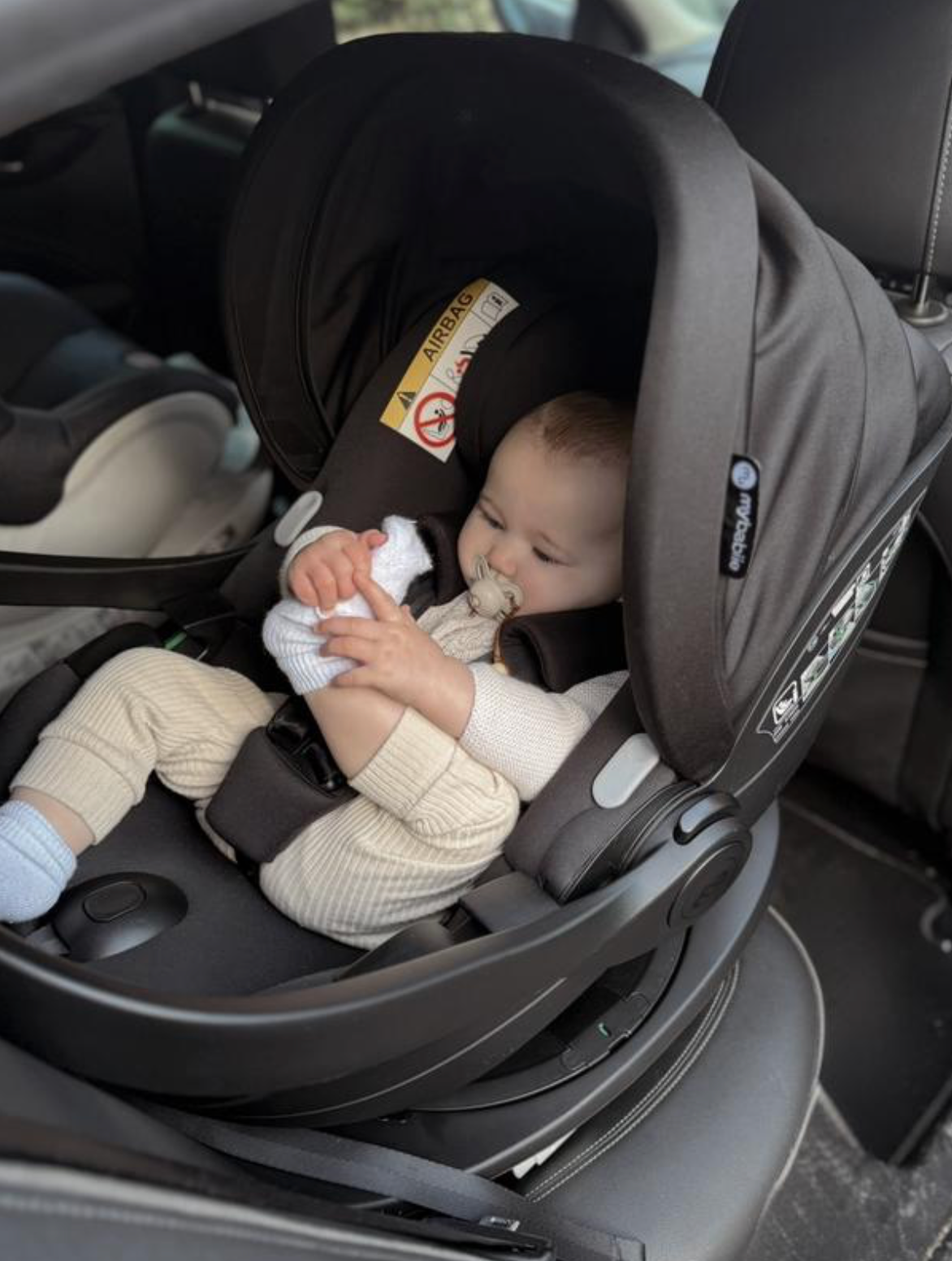 My Babiie Baby Car Seats collection featuring rear-facing newborn infant carriers with padded seats, protective head support and convenient carry handles.