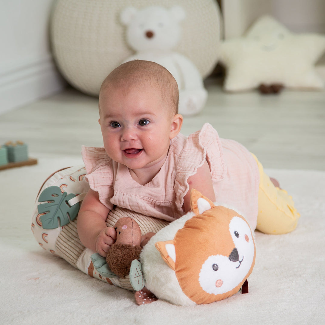 Baby toys collection featuring soft plush toys, rattles, activity toys, and sensory play items for newborns and infants