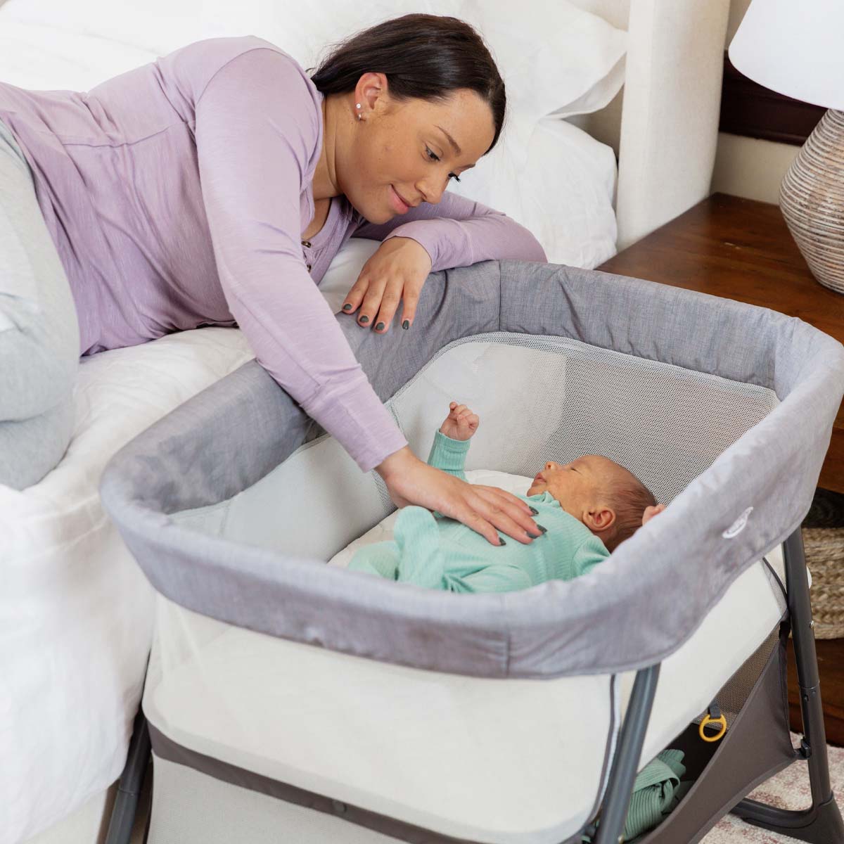 Bedside cribs collection featuring adjustable co-sleeper cribs with mesh sides designed for safe and convenient newborn sleep next to parents’ bed