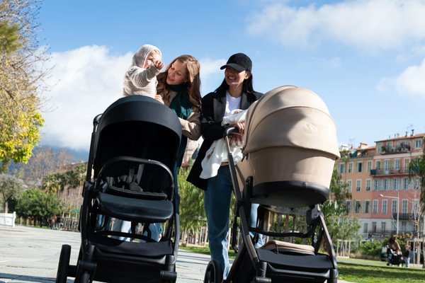 Luxury baby travel system with pushchair, carrycot, and infant car seat designed for premium comfort and smooth everyday travel.