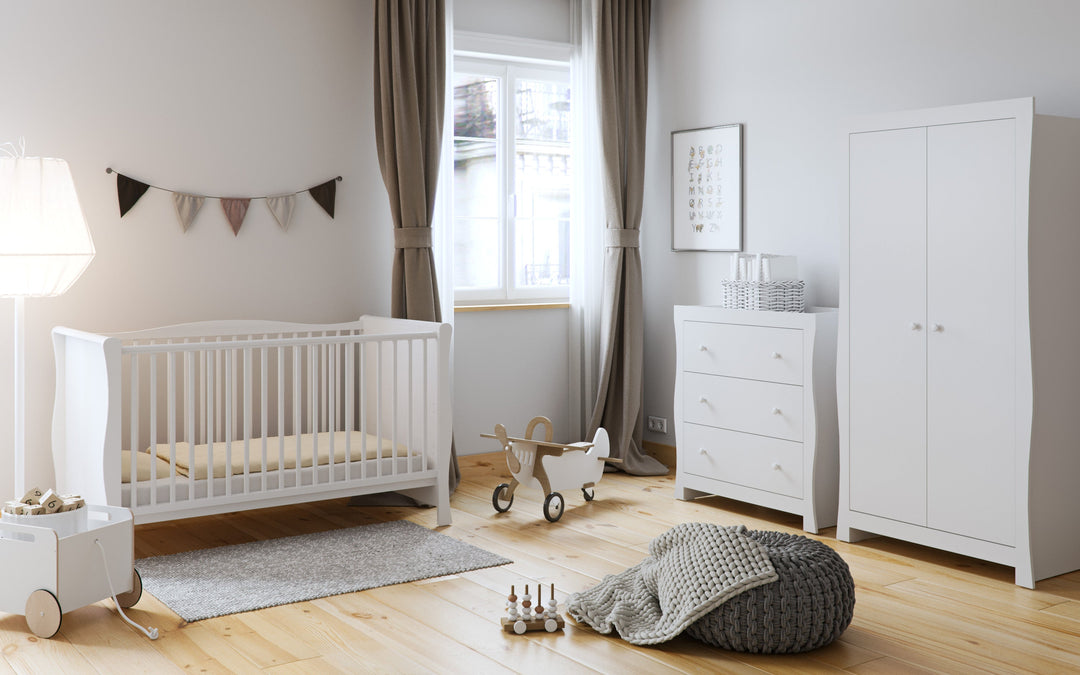 Little Acorns Traditional Sleigh nursery furniture collection with sleigh cot bed, wardrobe and chest changer in a traditional nursery