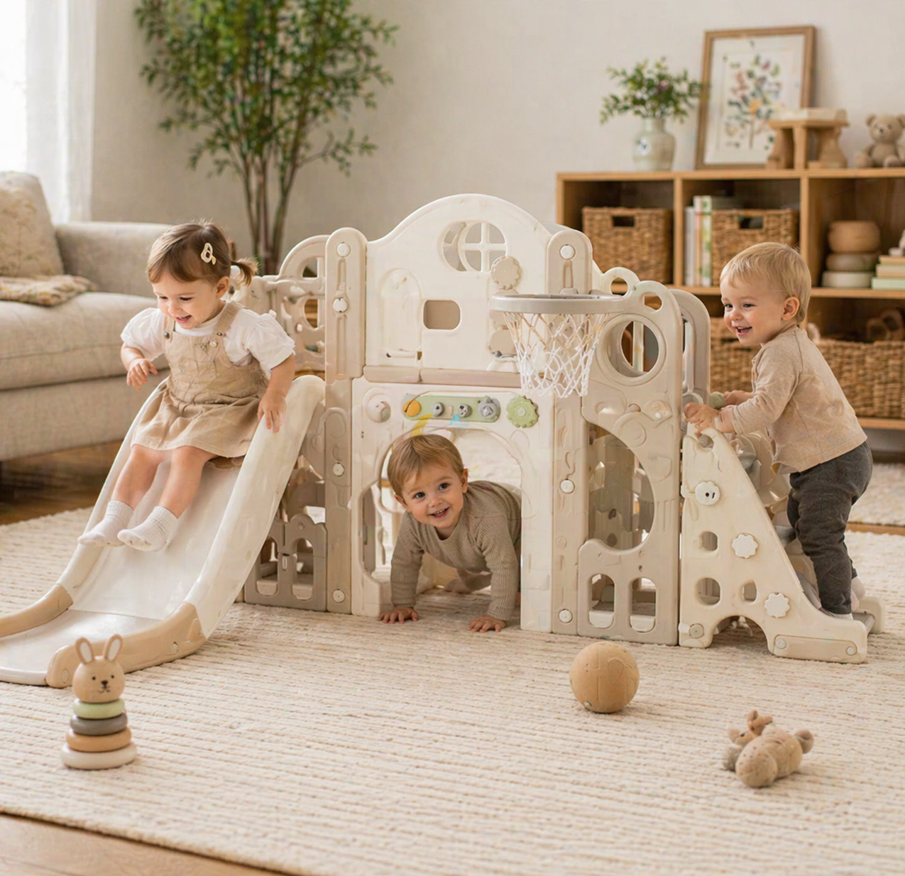 Indoor activity toys collection featuring toddlers playing on a multi-activity play centre with slide and climbing features in a bright, modern playroom setting