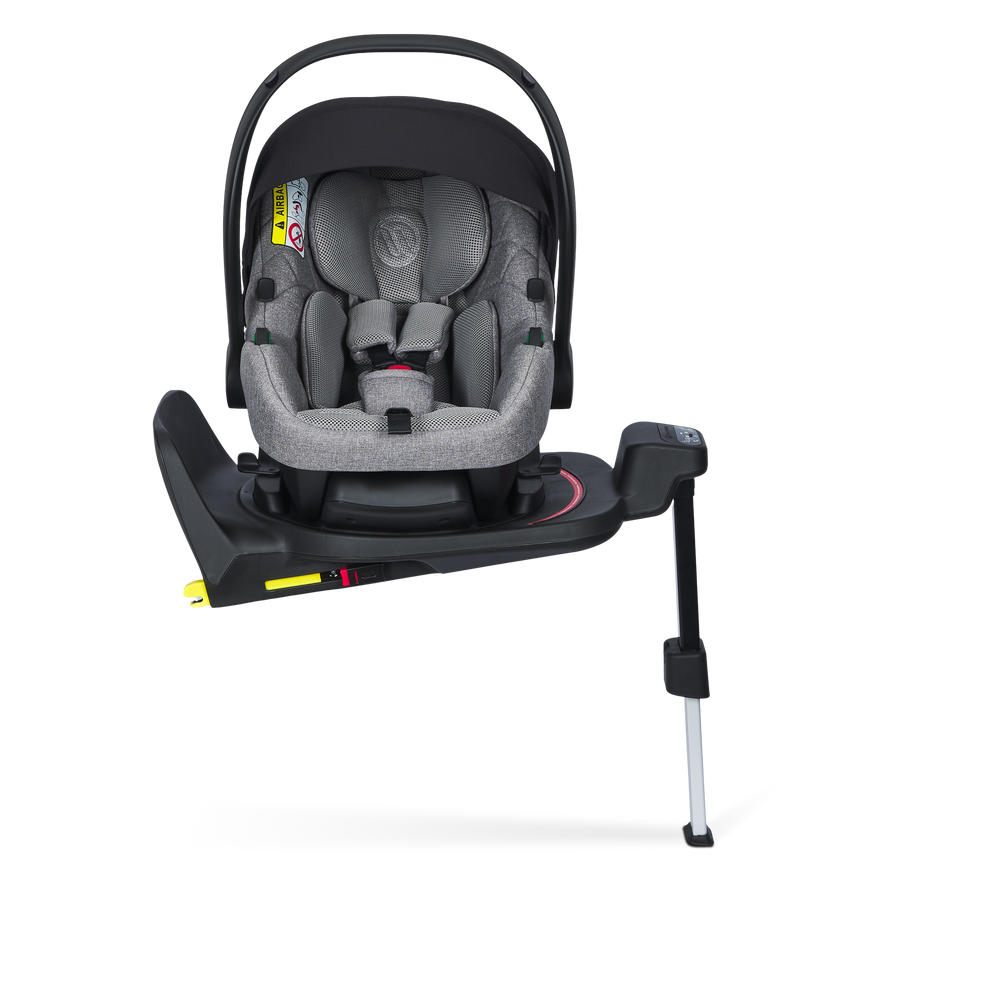 Baby car seat with base on a white background