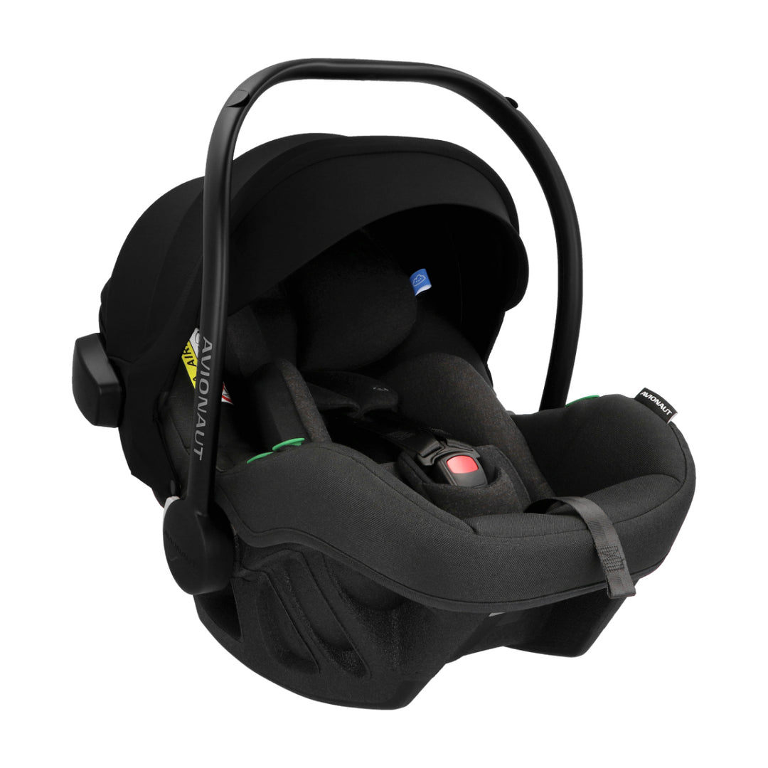 Black baby car seat with canopy on a white background
