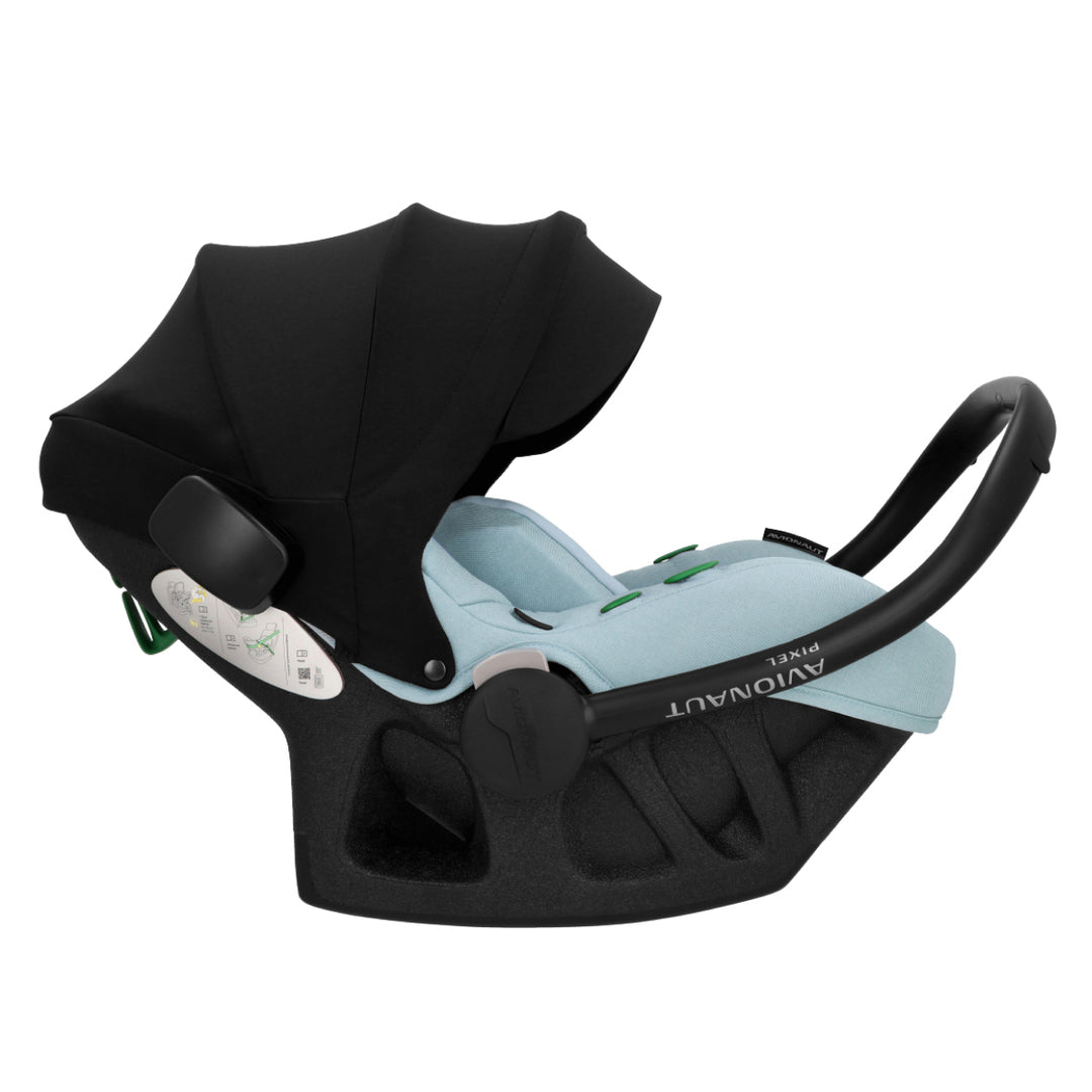 Baby car seat with black canopy and light blue seat on a white background