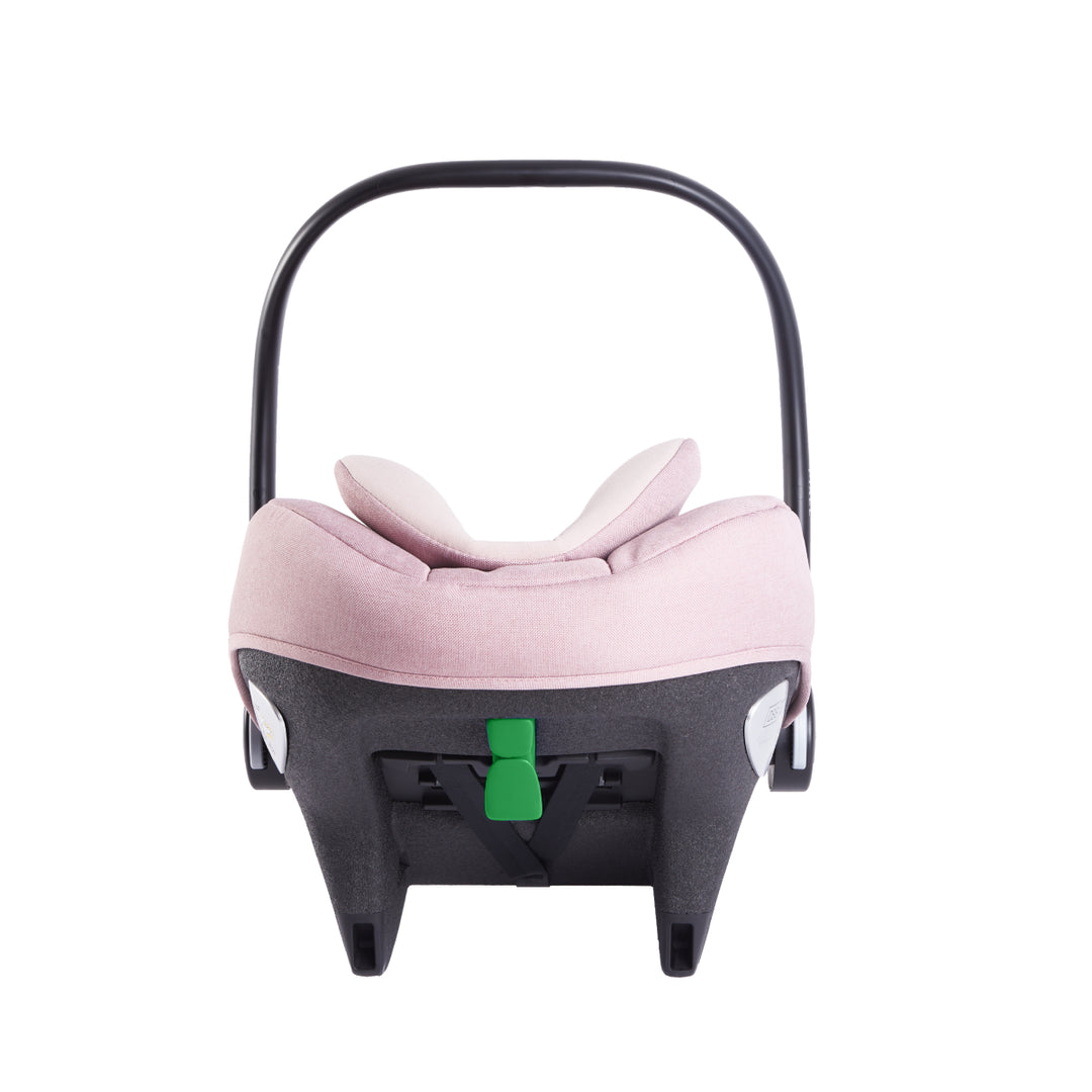 Baby car seat with pink cushion and black frame on a white background