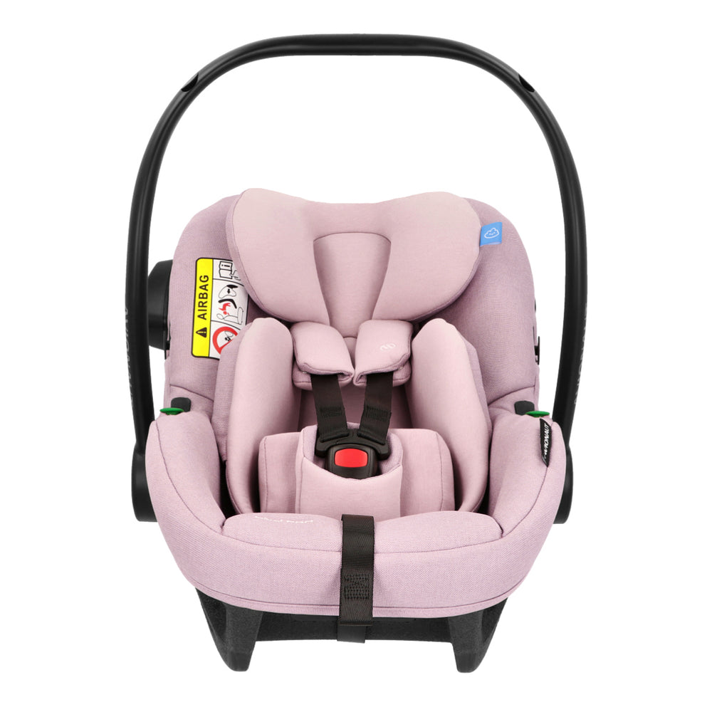 Pink baby car seat with black frame on a white background