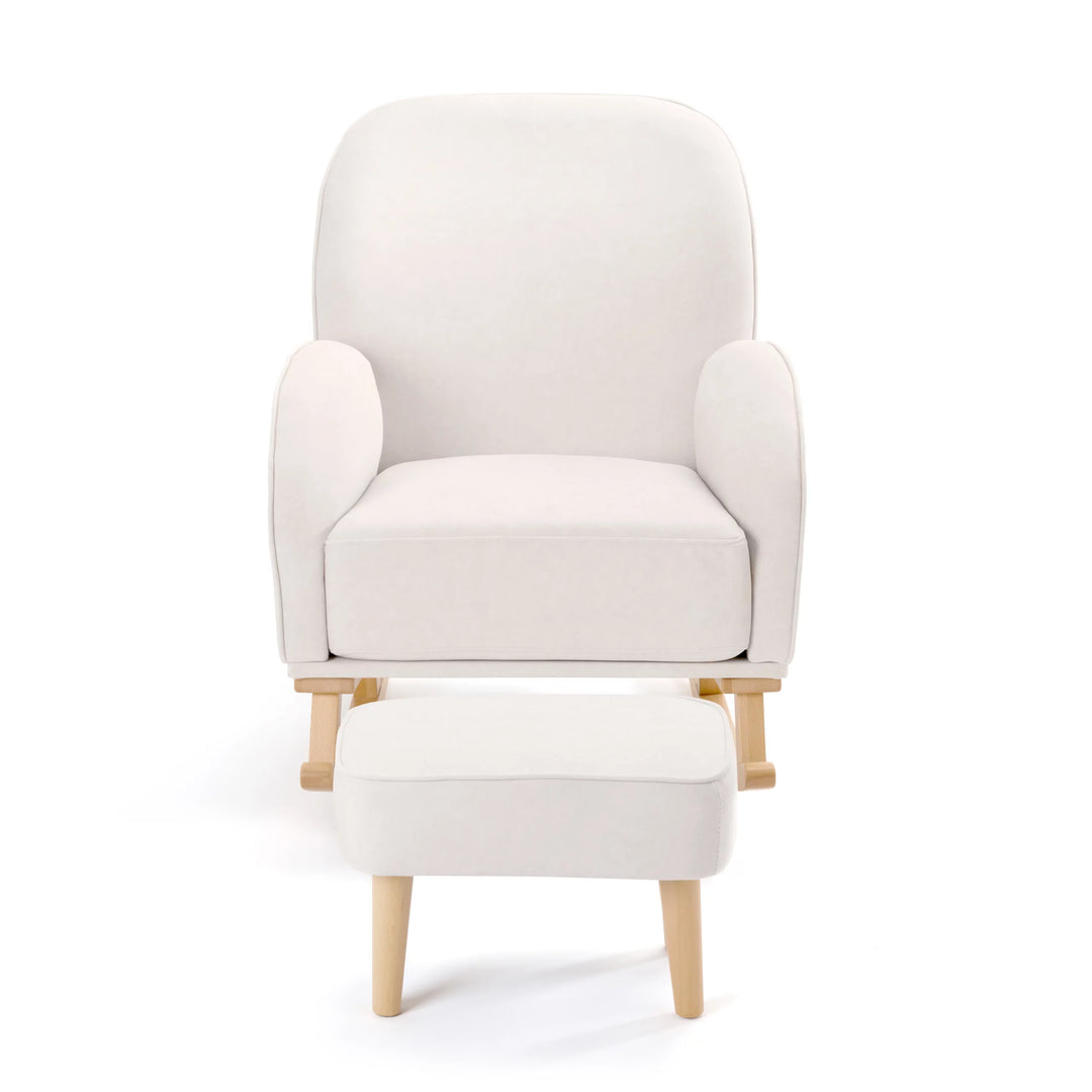 Cream armchair with matching ottoman on a white background