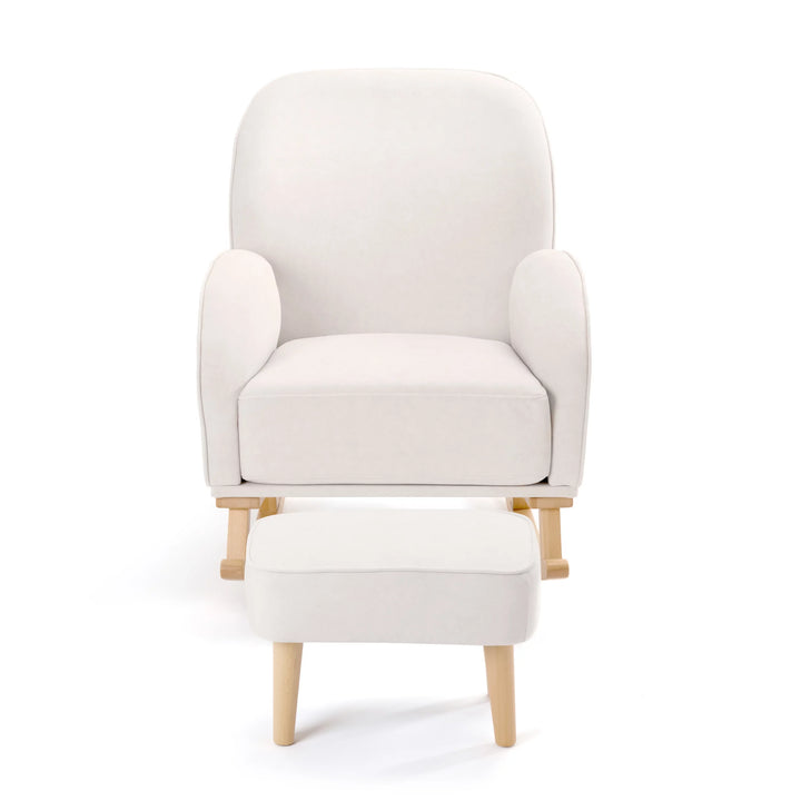 Cream armchair with matching ottoman on a white background
