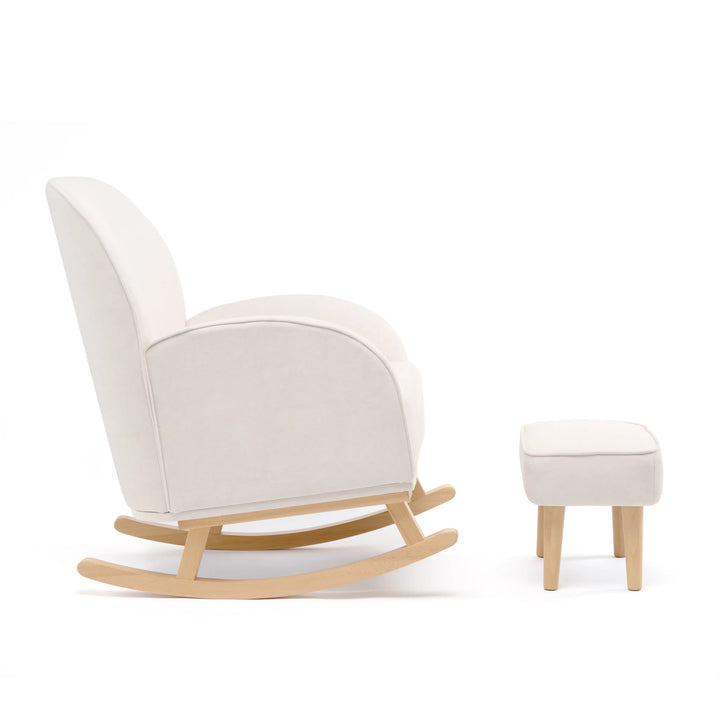 Cream rocking chair with wooden legs and matching ottoman on a white background