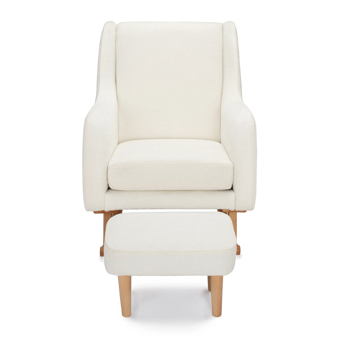 Off White nursing chair with matching ottoman on a white background