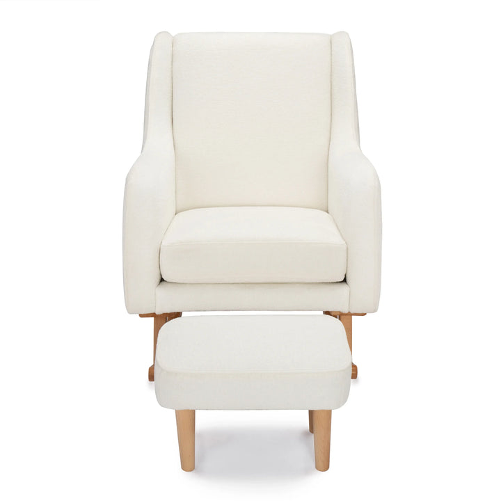 Off White nursing chair with matching ottoman on a white background
