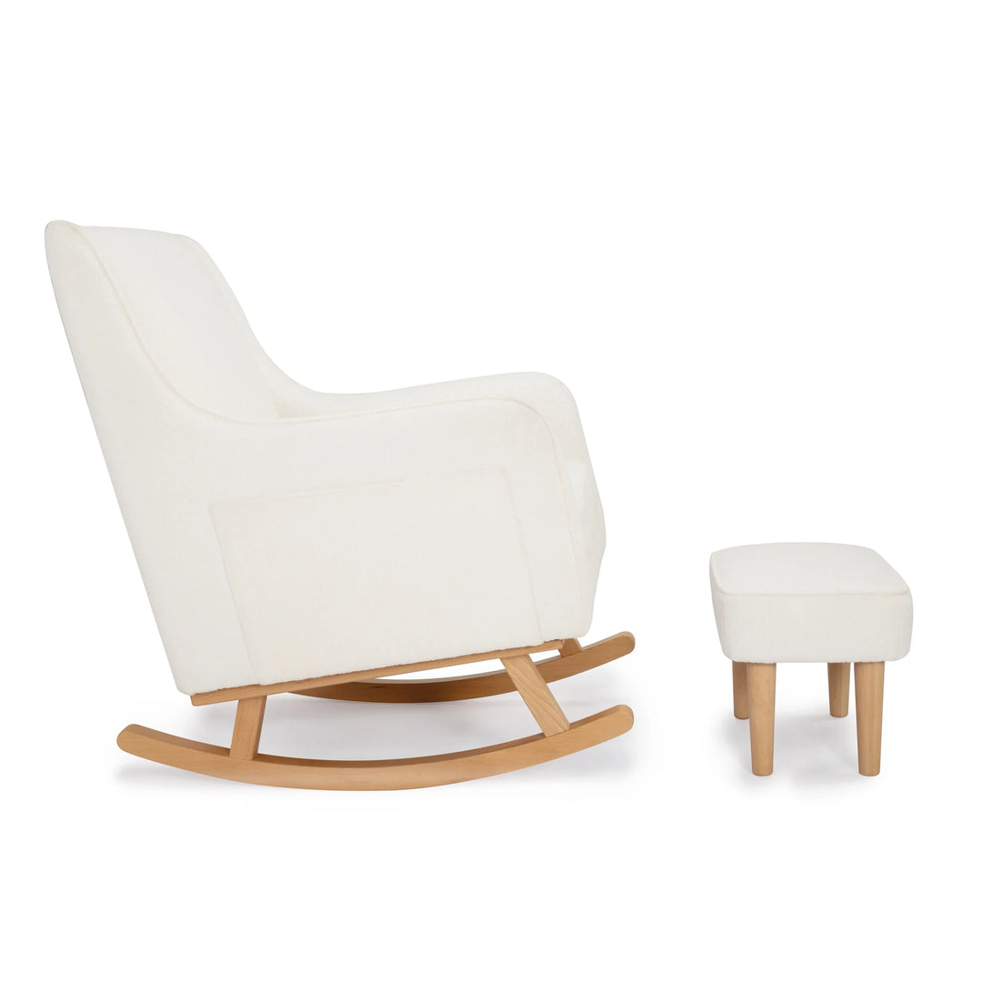 Off White nursing chair with wooden legs and matching footstool on a white background