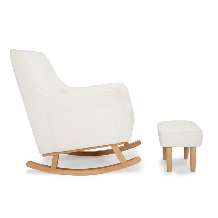 Off White nursing chair with wooden legs and matching footstool on a white background