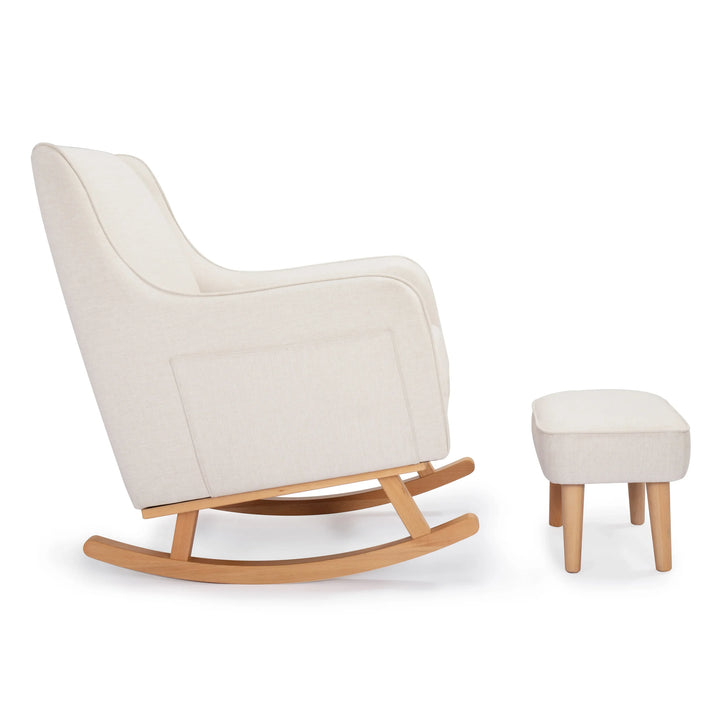 Beige rocking chair with wooden legs and matching ottoman on a white background