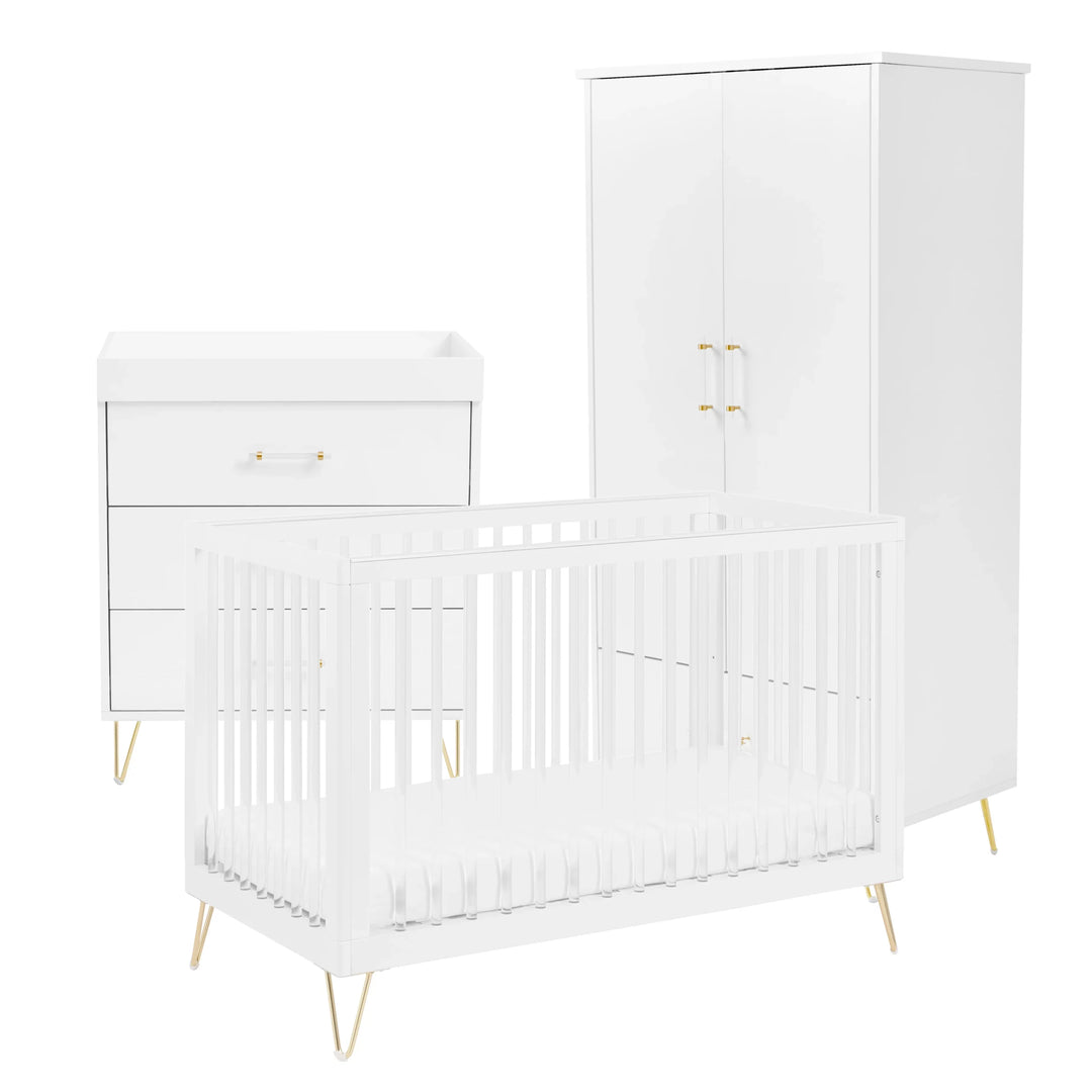 White crib, wardrobe and changing table set with gold legs on a white background