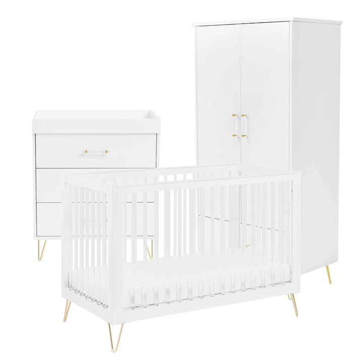 White crib, wardrobe and changing table set with gold legs on a white background