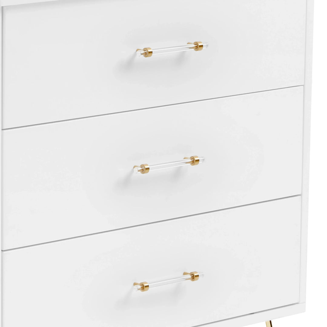 White dresser with gold handles on a white background