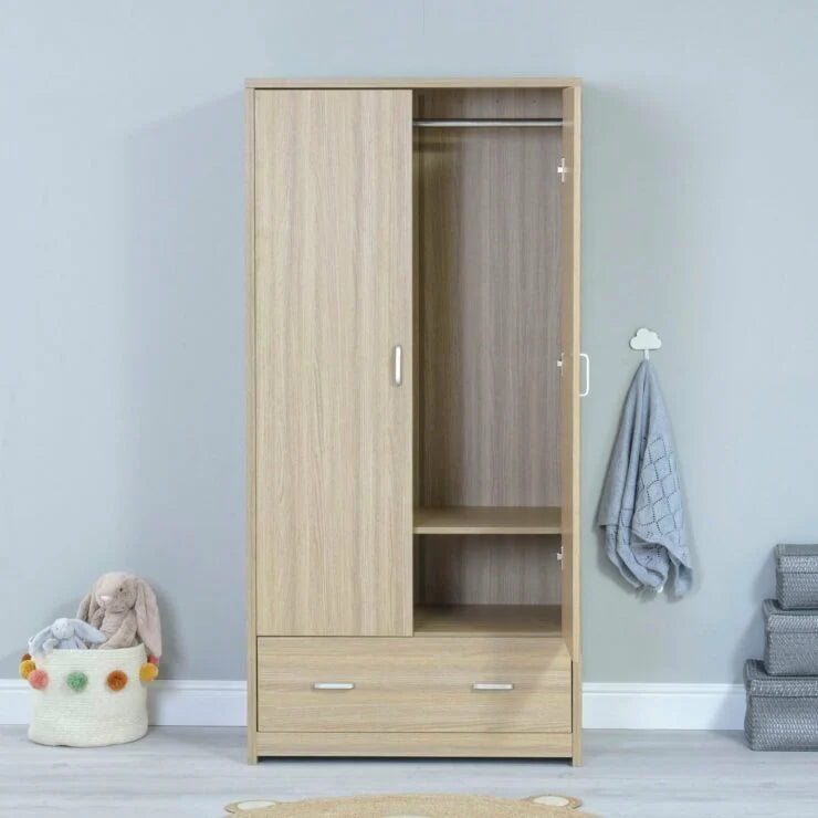 Wooden wardrobe with open door in a room with light blue walls and gray flooring.