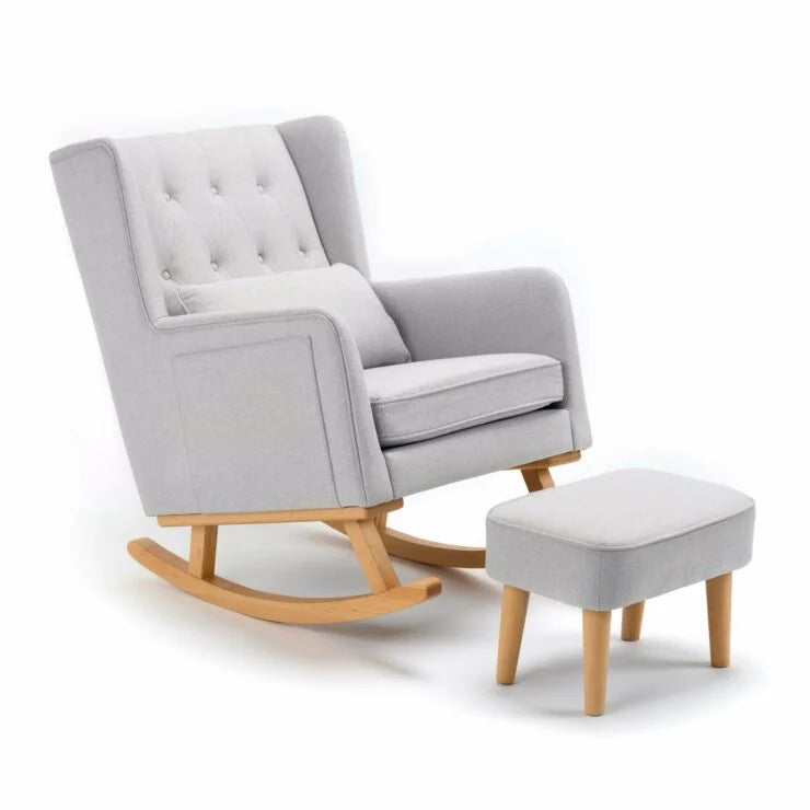 Grey rocking chair with wooden legs and matching ottoman on a white background