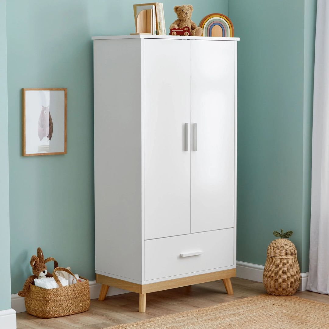 Babymore Mona Wardrobe in a lifestyle setting with toys