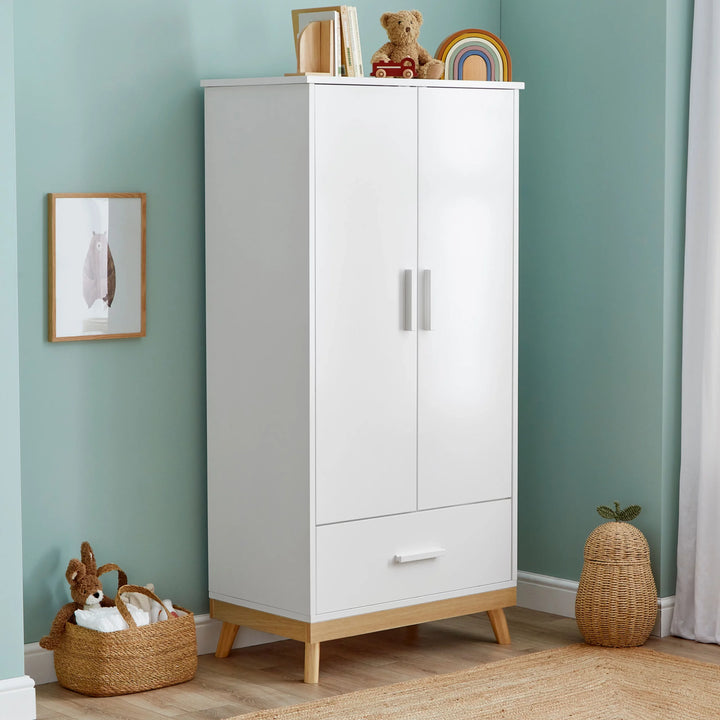 Babymore Mona Wardrobe in a lifestyle setting with toys