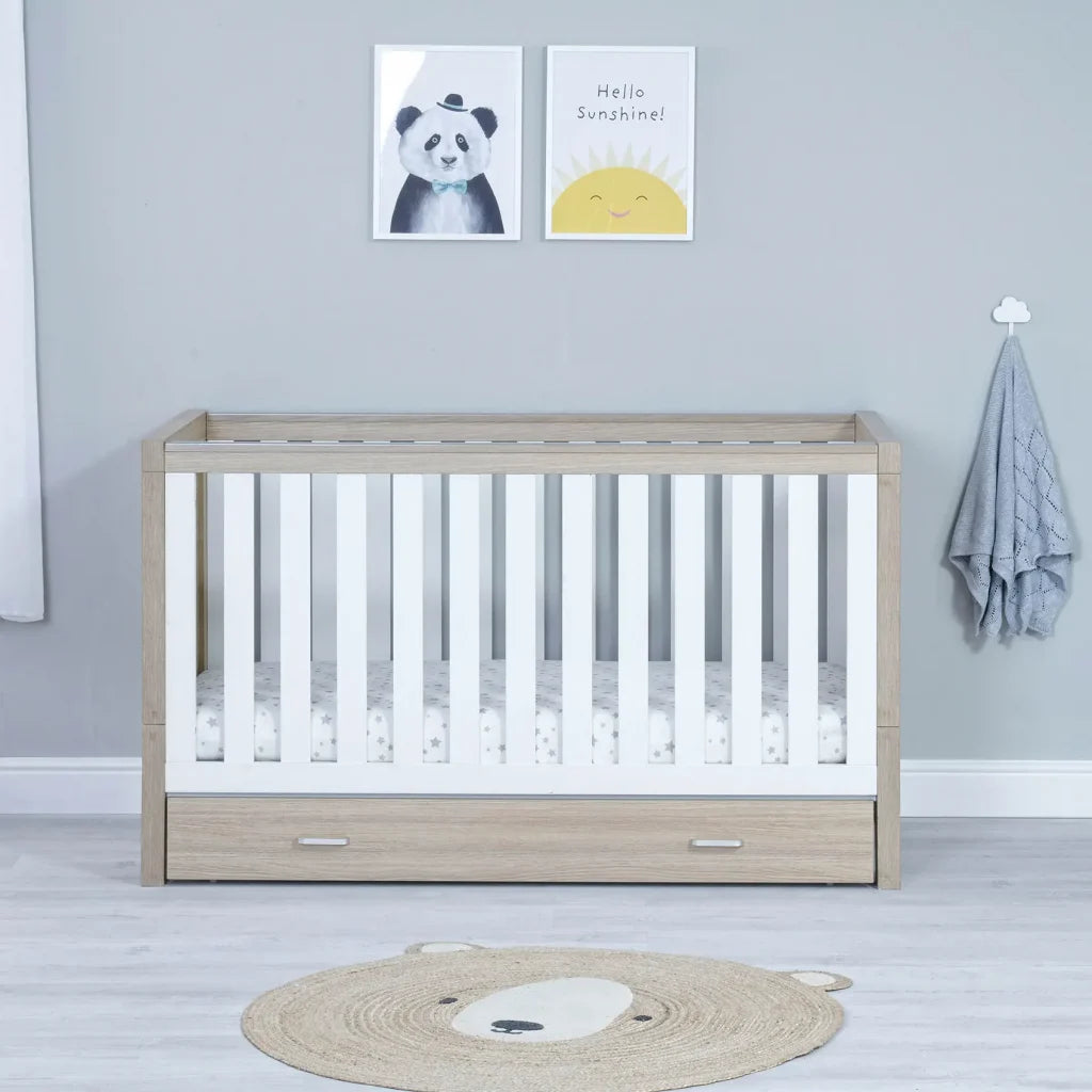 Babymore Luno White Oak Cot Bed with drawer lifestyle image