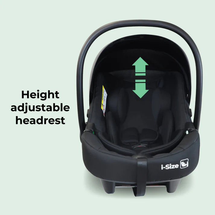 My Babiie I-size infant carrier with height adjustable headrest feature on a light green background