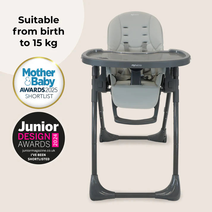 My Babiie Luxe Highchair in Grey with awards on a beige background