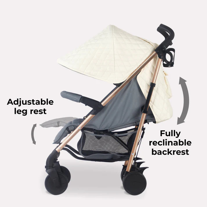 My Babiie MB51 Quilted Champagne stroller with adjustable leg rest and fully reclinable backrest on a white background