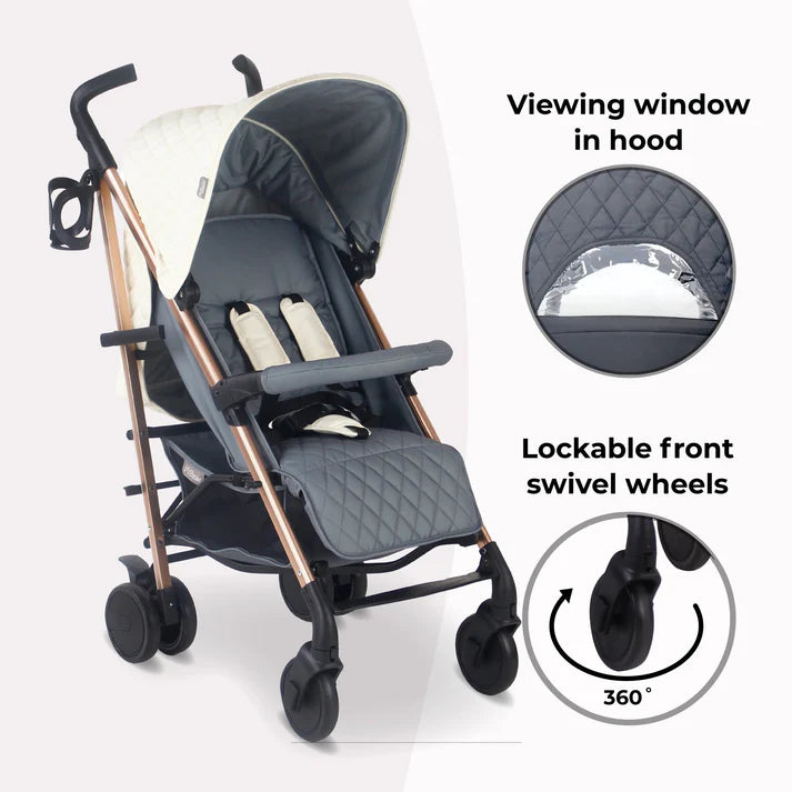 My Babiie MB51 Quilted Champagne stroller with viewing window in hood and lockable front swivel wheels on a white background