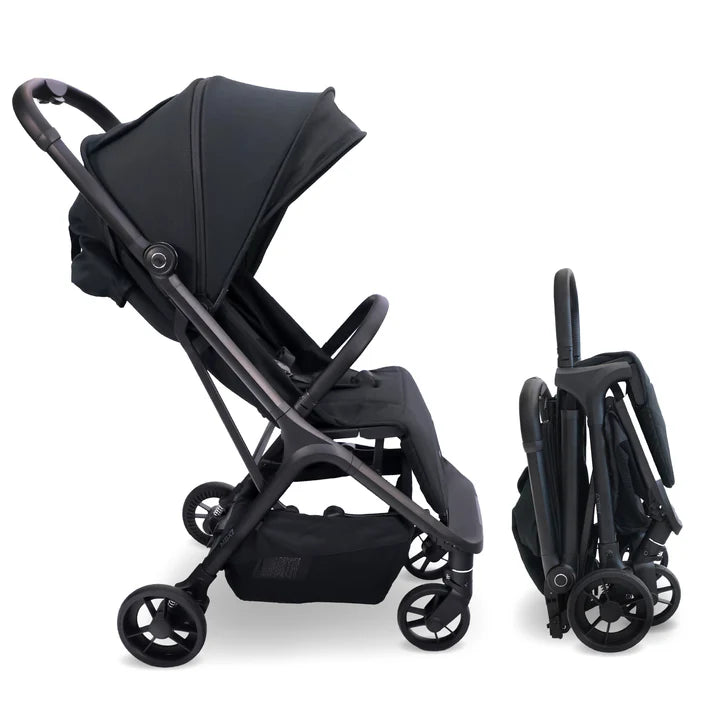 My Babiie MBX7 auto-fold stroller in black folded