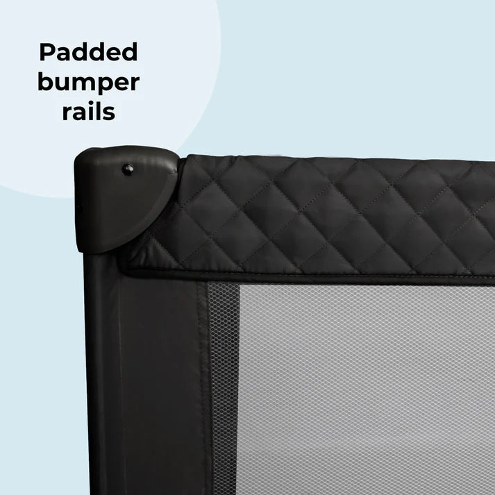 My Babiie Black Quilted Travel Cot with Black quilted bumper rail 