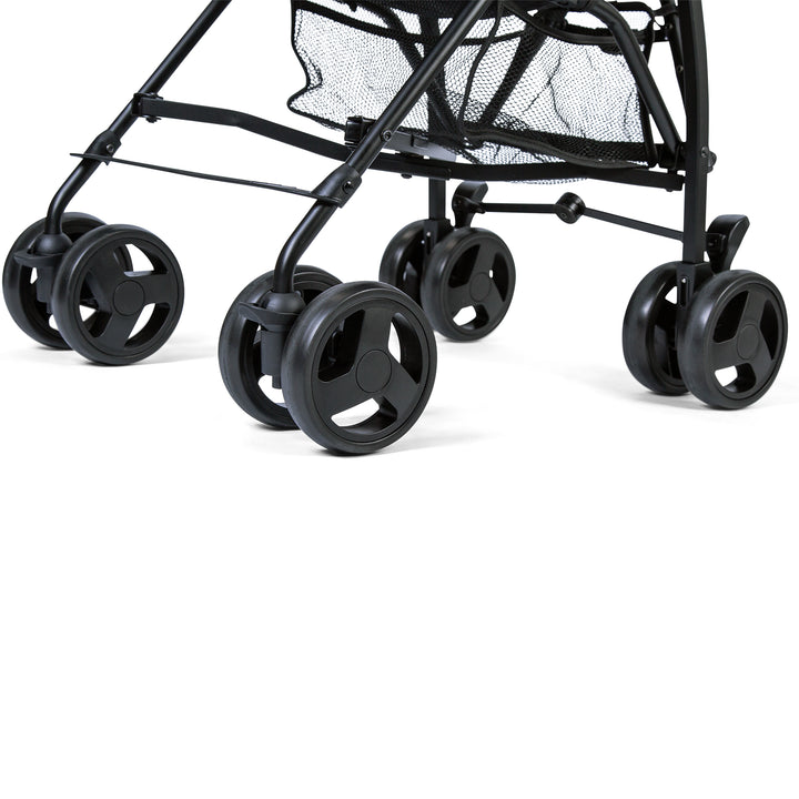 Close-up of Red Kite Push Me 2U midnight stroller  with wheels on a white background