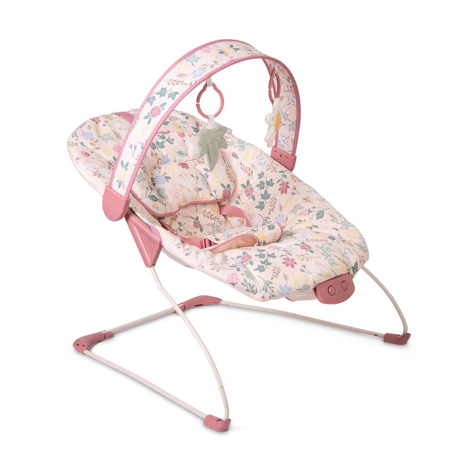 Red Kite Cozy Bounce Floral-patterned baby bouncer with pink accents on a white background