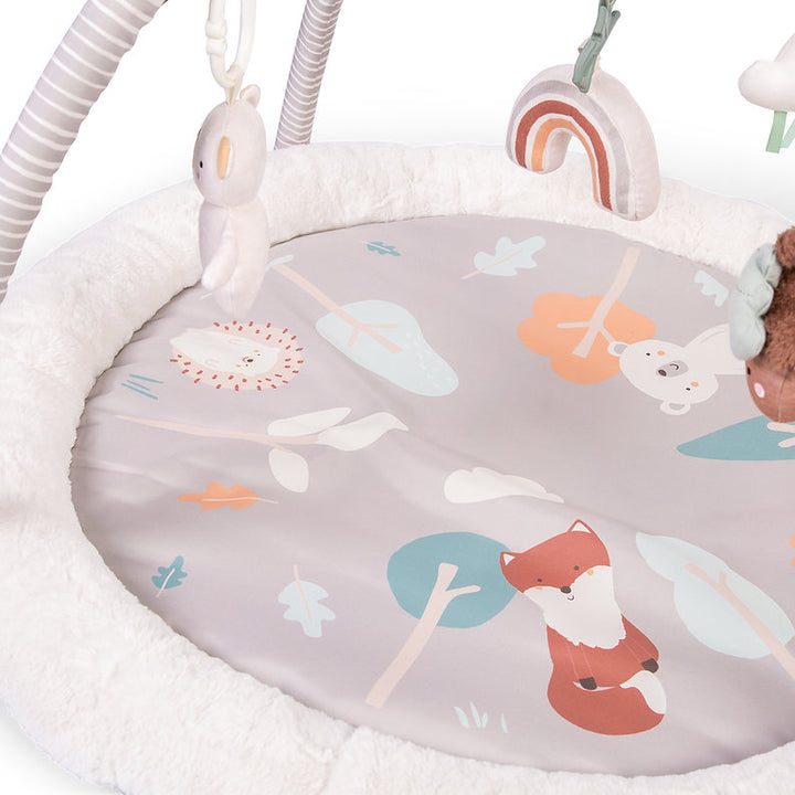 Red Kite Woodland Walks Play Gym with forest-themed design and hanging toys