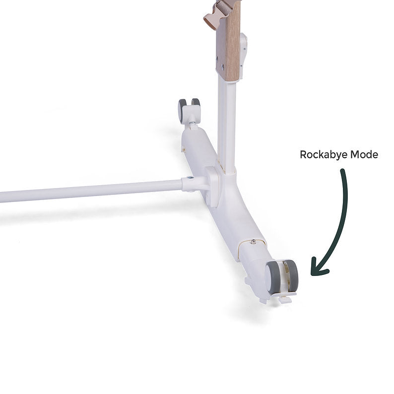 Red Kite Rockabye Bedside Crib with 'Rockabye Mode' feature highlighted on a white background