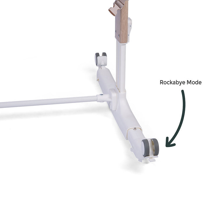 Red Kite Rockabye Bedside Crib with 'Rockabye Mode' feature highlighted on a white background