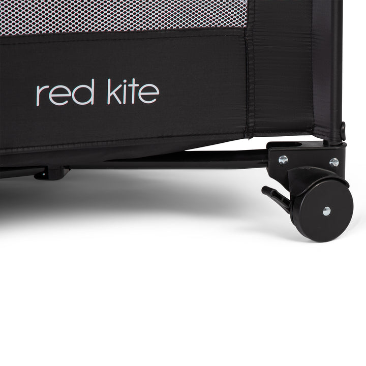 Red Kite Sleeptight Travel Cot in Black wheel detail