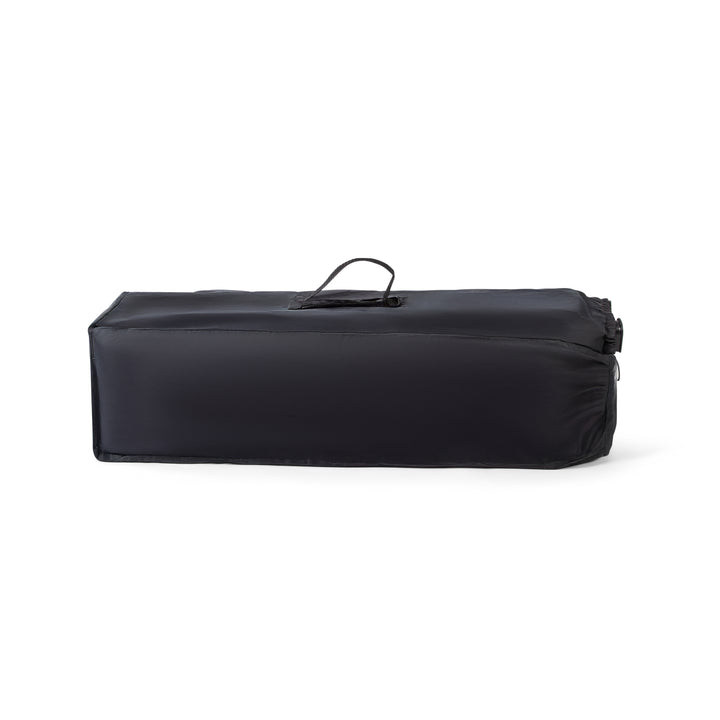 Red Kite Sleeptight Travel Cot in Black folded in carry bag