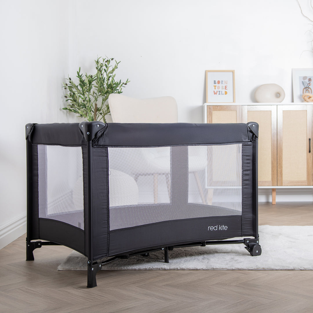 Red Kite Sleeptight Travel Cot in Black lifestyle image