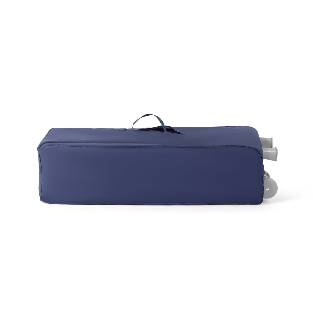 Red Kite Sleeptight Travel Cot in Blueberry folded and in carry bag