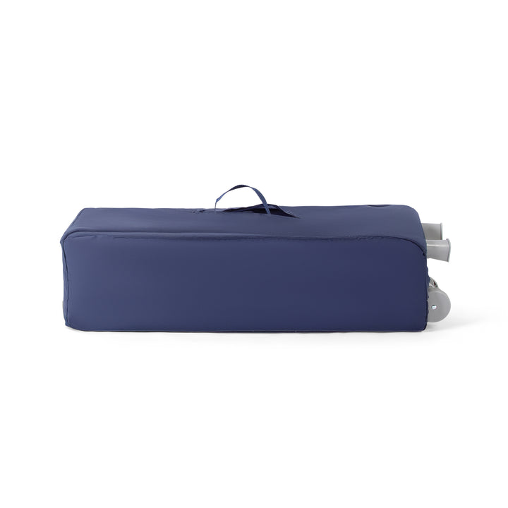 Red Kite Sleeptight Travel Cot in Blueberry folded and in carry bag