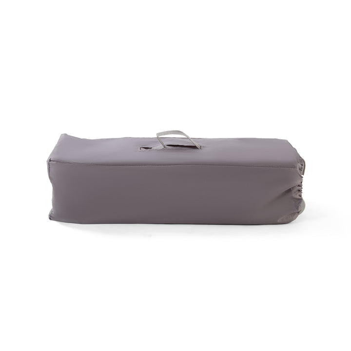 Red Kite Sleeptight Travel Cot in Grey folded in carry bag