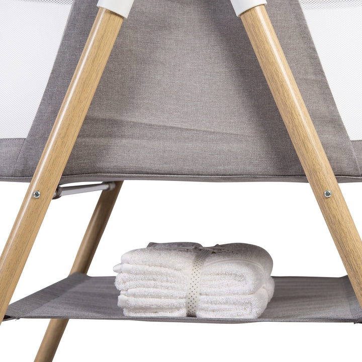 Red Kite Snooze Crib shelf with white towels